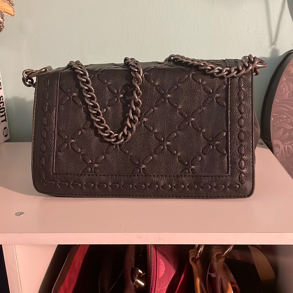 Black bag with gun metal chain with a faux letter strap